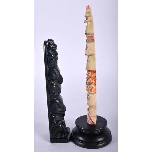 396 - AN EARLY 20TH CENTURY NORTH AMERICAN INUIT CARVED BONE TOTEM POLE together with another. Largest 16 ... 