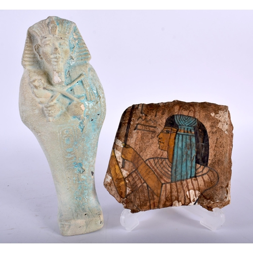 397 - AN EGYPTIAN FAIENCE GLAZED USHABTI FIGURE OF A PHARAOH together with a painted Egyptian fragment. La... 