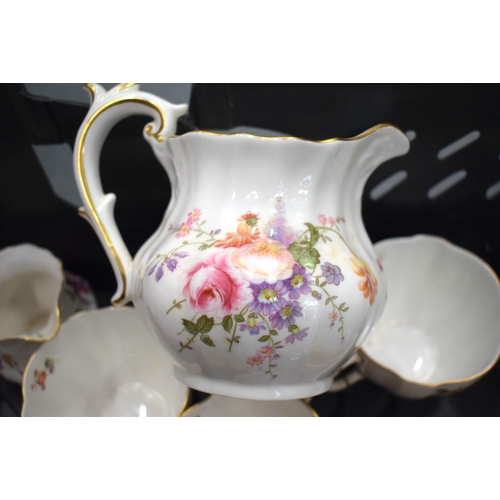 41 - A LARGE ROYAL CROWN DERBY PORCELAIN TEA SERVICE mainly Derby Posies pattern. (qty)