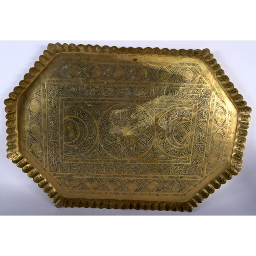 410 - A LARGE ANTIQUE MIDDLE EASTERN ISLAMIC PERSIAN BRASS CALLIGRAPHY TRAY together with a similar circul... 