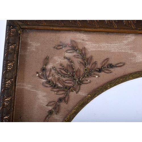 421 - A LATE 19TH CENTURY FRENCH GILT METAL EMBROIDERED EMPIRE TYPE PHOTOGRAPH FRAME.20 cm x 15 cm.