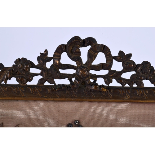 421 - A LATE 19TH CENTURY FRENCH GILT METAL EMBROIDERED EMPIRE TYPE PHOTOGRAPH FRAME.20 cm x 15 cm.