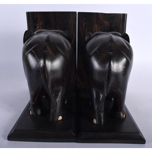 431 - A PAIR OF LATE 19TH/20TH CENTURY COUNTRY HOUSE COROMANDEL ELEPHANT BOOKENDS. Each end 21 cm x 18 cm.