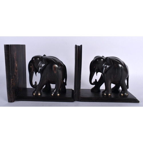 431 - A PAIR OF LATE 19TH/20TH CENTURY COUNTRY HOUSE COROMANDEL ELEPHANT BOOKENDS. Each end 21 cm x 18 cm.