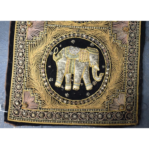 435 - AN INDIAN EMBROIDERED COUNTRY HOUSE ELEPHANT WALL HANGING. 145 cm x 35 cm.