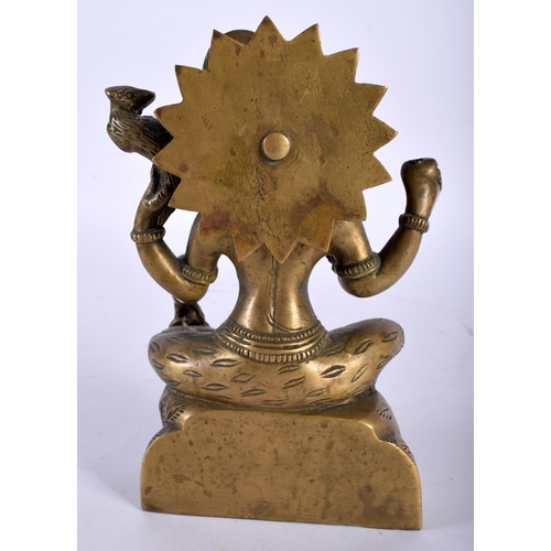 439 - A 19TH CENTURY MIDDLE EASTERN INDIAN BRONZE FIGURE OF A DEITY modelled with multiple arms. 16 cm x 8... 