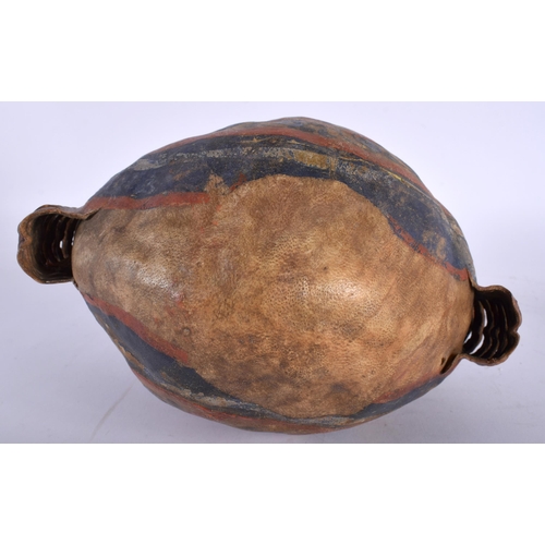 446 - AN ISLAMIC MIDDLE EASTERN PAINTED HIDE GUNPOWDER FLASK. 34 cm x 22 cm.