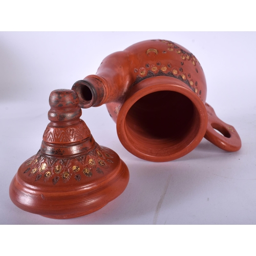 447 - A TURKISH TOPHANE POTTERY COFFEE POT AND COVER painted with gilt motifs. 18 cm x 13 cm.