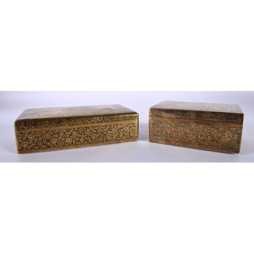 472 - A 19TH CENTURY INDIAN BRASS AND BLACK ENAMEL RECTANGULAR TABLE BOX together with a similar smaller b... 