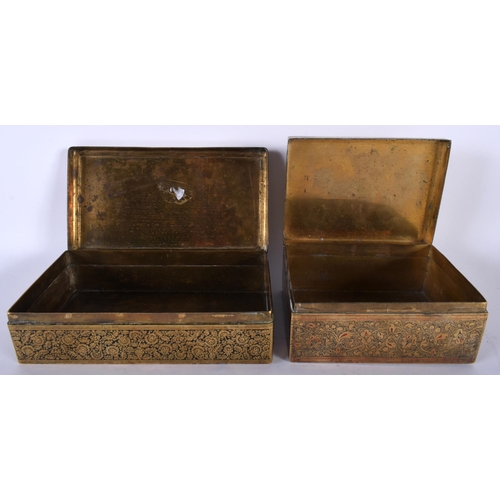 472 - A 19TH CENTURY INDIAN BRASS AND BLACK ENAMEL RECTANGULAR TABLE BOX together with a similar smaller b... 