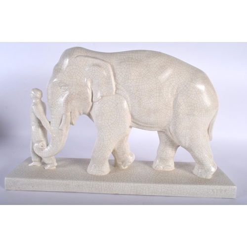 47 - AN ART DECO FRENCH STEF POTTERY FIGURAL GROUP OF MAHOOT AND THE ELEPHANT. 48 cm x 32 cm.