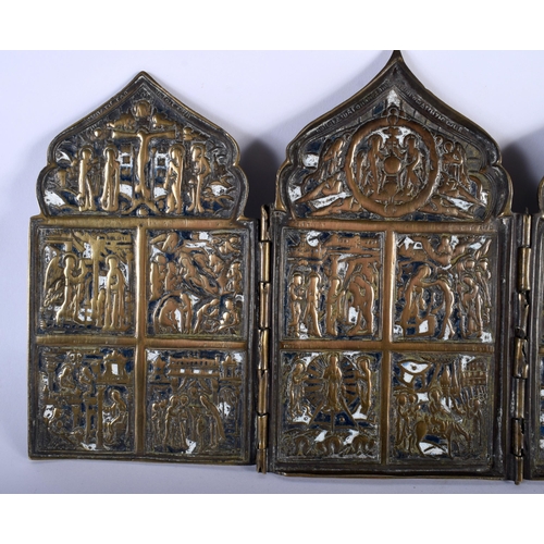 475 - AN 18TH CENTURY RUSSIAN ENAMELLED BRONZE FOLDING TRIPTYCH ICON depicting saints and scripture. 37 cm... 