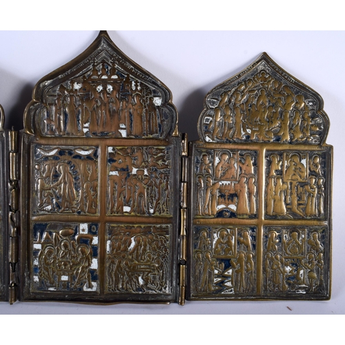 475 - AN 18TH CENTURY RUSSIAN ENAMELLED BRONZE FOLDING TRIPTYCH ICON depicting saints and scripture. 37 cm... 