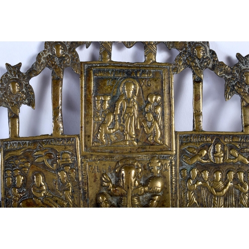 476 - AN 18TH CENTURY RUSSIAN BRONZE CRUCIFIXION ICON modelled with saints in various pursuits, the revers... 