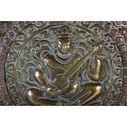 477 - A VERY LARGE 19TH CENTURY INDIAN TIBETAN COPPER AND MIXED METAL CHARGER of monumental proportions, i... 