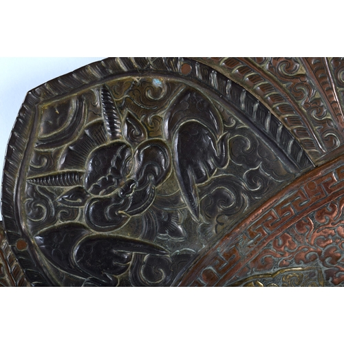 477 - A VERY LARGE 19TH CENTURY INDIAN TIBETAN COPPER AND MIXED METAL CHARGER of monumental proportions, i... 