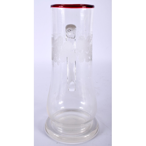 480 - A BOHEMIAN CLEAR AND RUBY GLASS JUG. 22 cm high.