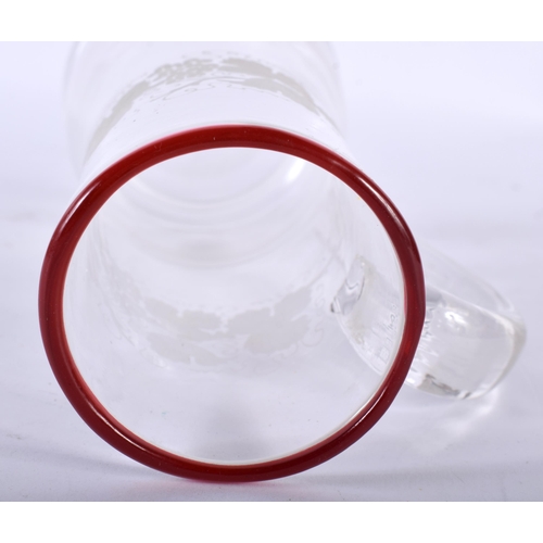 480 - A BOHEMIAN CLEAR AND RUBY GLASS JUG. 22 cm high.