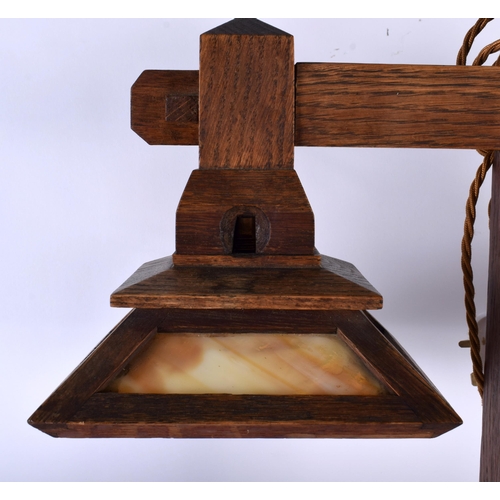 487 - A RARE 1920S AMERICAN MISSION STYLE OAK LAMP of angular form with two downlights. 56 cm x 40 cm.