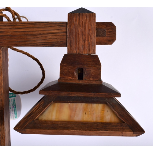 487 - A RARE 1920S AMERICAN MISSION STYLE OAK LAMP of angular form with two downlights. 56 cm x 40 cm.