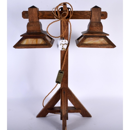 487 - A RARE 1920S AMERICAN MISSION STYLE OAK LAMP of angular form with two downlights. 56 cm x 40 cm.