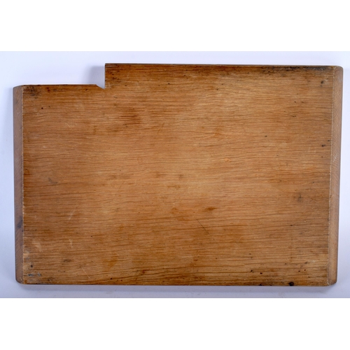 489 - A ROBERT THOMPSON MOUSEMAN CHOPPING BOARD. 32 cm x 22 cm.