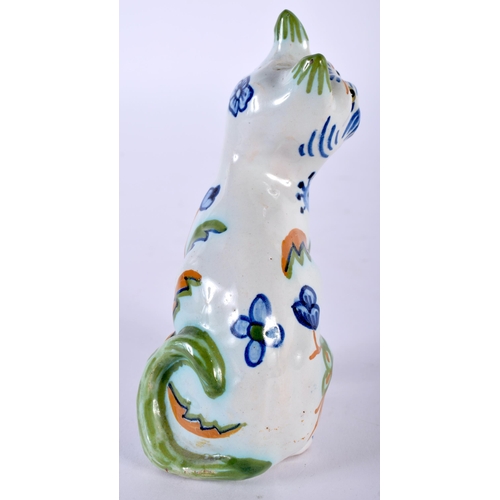 495 - A SMALL MASONIC FAIENCE TIN GLAZED POTTERY FIGURE OF A CAT. 10 cm x 5 cm.