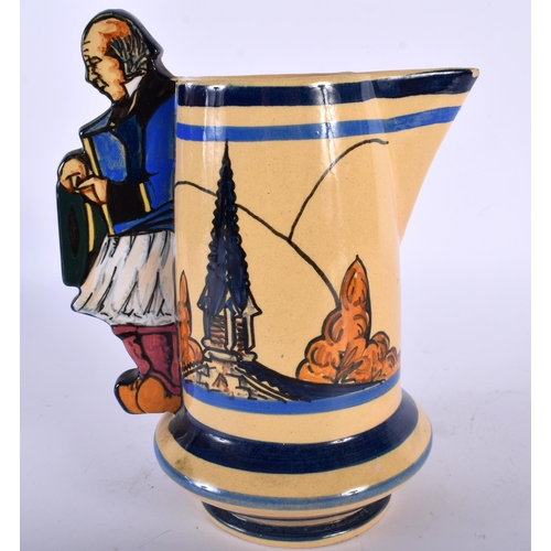 504 - A RARE HENRIOT QUIMPER POTTERY JUG with figural handle, painted with landscapes. 20 cm x 12 cm.