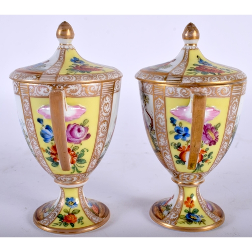 509 - A PAIR OF LATE 19TH CENTURY DRESDEN AUGUSTUS REX PORCELAIN VASES AND COVERS painted with landscapes.... 