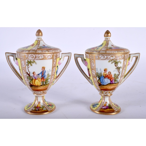 509 - A PAIR OF LATE 19TH CENTURY DRESDEN AUGUSTUS REX PORCELAIN VASES AND COVERS painted with landscapes.... 