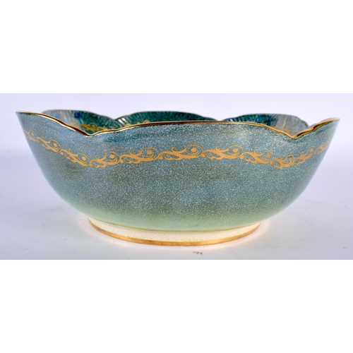 515D - AN ART DECO MINTON LUSTRE PORCELAIN SCALLOPED BOWL painted with a stylised cockerell. 26 cm diameter... 