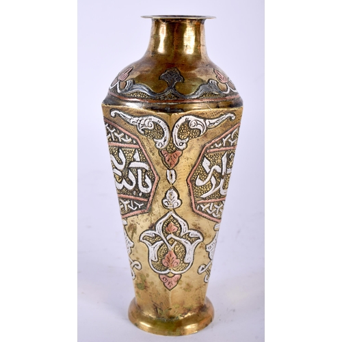 517 - A 19TH CENTURY MIDDLE EASTERN SILVER INLAID BRONZE VASE decorative with Kufic scripture. 14 cm high.