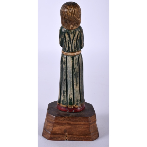 517E - AN 18TH/19TH CENTURY INDO PORTUGUESE GOA POLYCHROMED FIGURE OF A SAINT modelled upon a wooden base. ... 