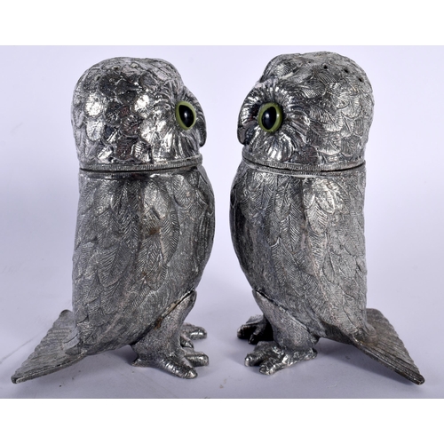 518D - A PAIR OF ANTIQUE SILVER PLATED GLASS EYED OWL CONDIMENTS. 686 grams. 11.75 cm x 7 cm.