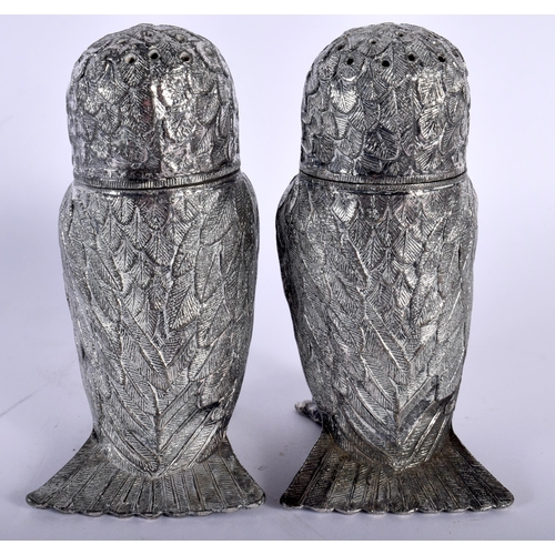 518D - A PAIR OF ANTIQUE SILVER PLATED GLASS EYED OWL CONDIMENTS. 686 grams. 11.75 cm x 7 cm.