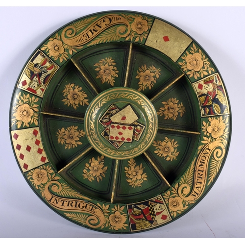 519E - AN ANTIQUE COUNTRY HOUSE GREEN LACQUER GILDING GAMING BOARD. 30 cm diameter.