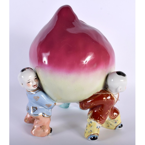 522E - AN UNUSUAL LARGE CHINESE REPUBLICAN PERIOD FIGURAL GROUP formed as boys holding aloft a peach. 28 cm... 