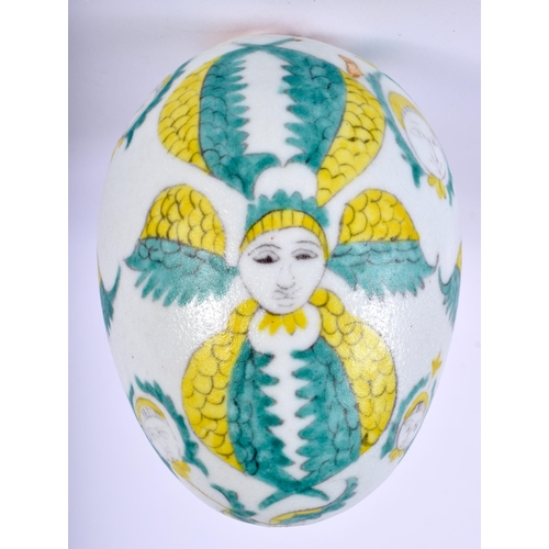 529 - AN ARMENIAN KUTAHYA POTTERY HANGING EGG painted with figures. 12 cm x 8 cm.