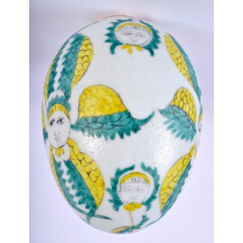 529 - AN ARMENIAN KUTAHYA POTTERY HANGING EGG painted with figures. 12 cm x 8 cm.