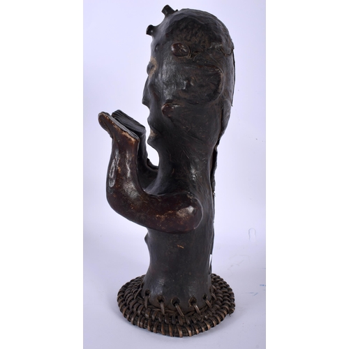 535 - AN AFRICAN TRIBAL SKIN COVERED FERTILITY FIGURE with moving arms. 28 cm high.