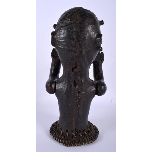 535 - AN AFRICAN TRIBAL SKIN COVERED FERTILITY FIGURE with moving arms. 28 cm high.