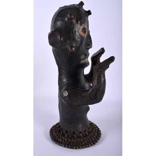 535 - AN AFRICAN TRIBAL SKIN COVERED FERTILITY FIGURE with moving arms. 28 cm high.