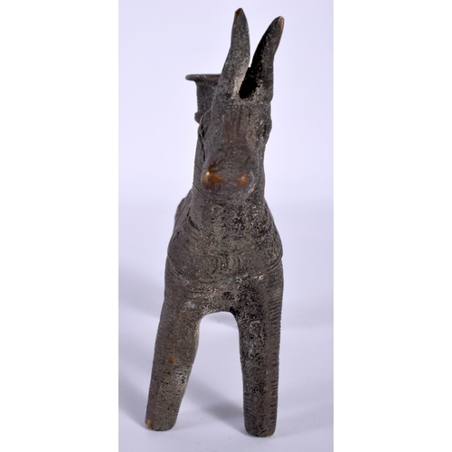 543 - AN ANTIQUE MIDDLE EASTERN ZOOMORPHIC BRONZE CANDLESTICK formed as a horse. 11 cm x 8 cm.