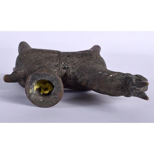 543 - AN ANTIQUE MIDDLE EASTERN ZOOMORPHIC BRONZE CANDLESTICK formed as a horse. 11 cm x 8 cm.