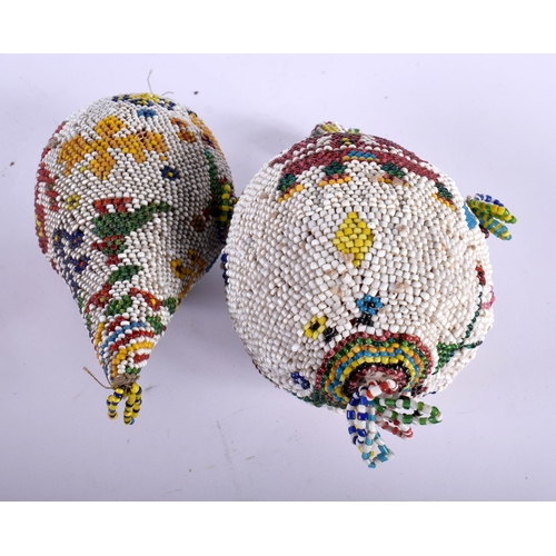 552 - TWO FINE ANTIQUE INDIAN BEADWORK OVERLAID GOURDS. 14 cm x 8 cm. (2)