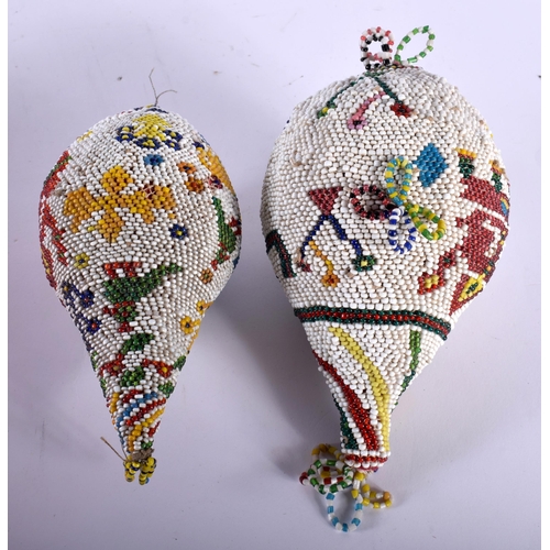 552 - TWO FINE ANTIQUE INDIAN BEADWORK OVERLAID GOURDS. 14 cm x 8 cm. (2)