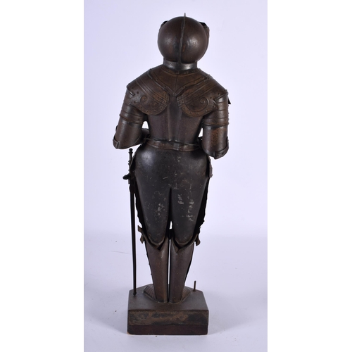 558 - AN EDWARDIAN MINIATURE SUIT OF ARMOUR. 40 cm high.