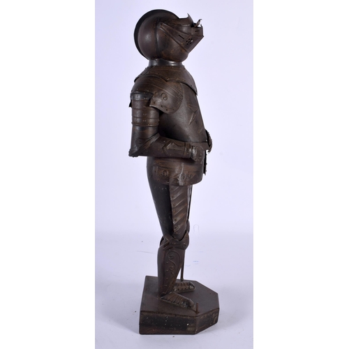 558 - AN EDWARDIAN MINIATURE SUIT OF ARMOUR. 40 cm high.