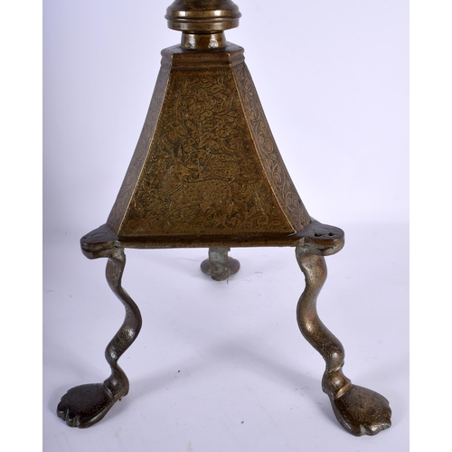 564 - A VERY LARGE 18TH CENTURY ISLAMIC MIDDLE EASTERN BRONZE PRICKET CANDLESTICK decorative all over with... 