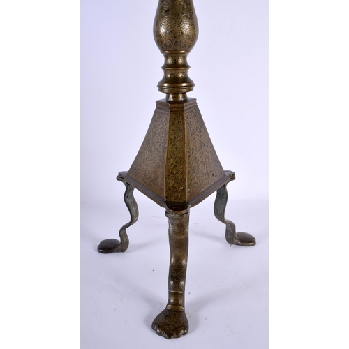 564 - A VERY LARGE 18TH CENTURY ISLAMIC MIDDLE EASTERN BRONZE PRICKET CANDLESTICK decorative all over with... 